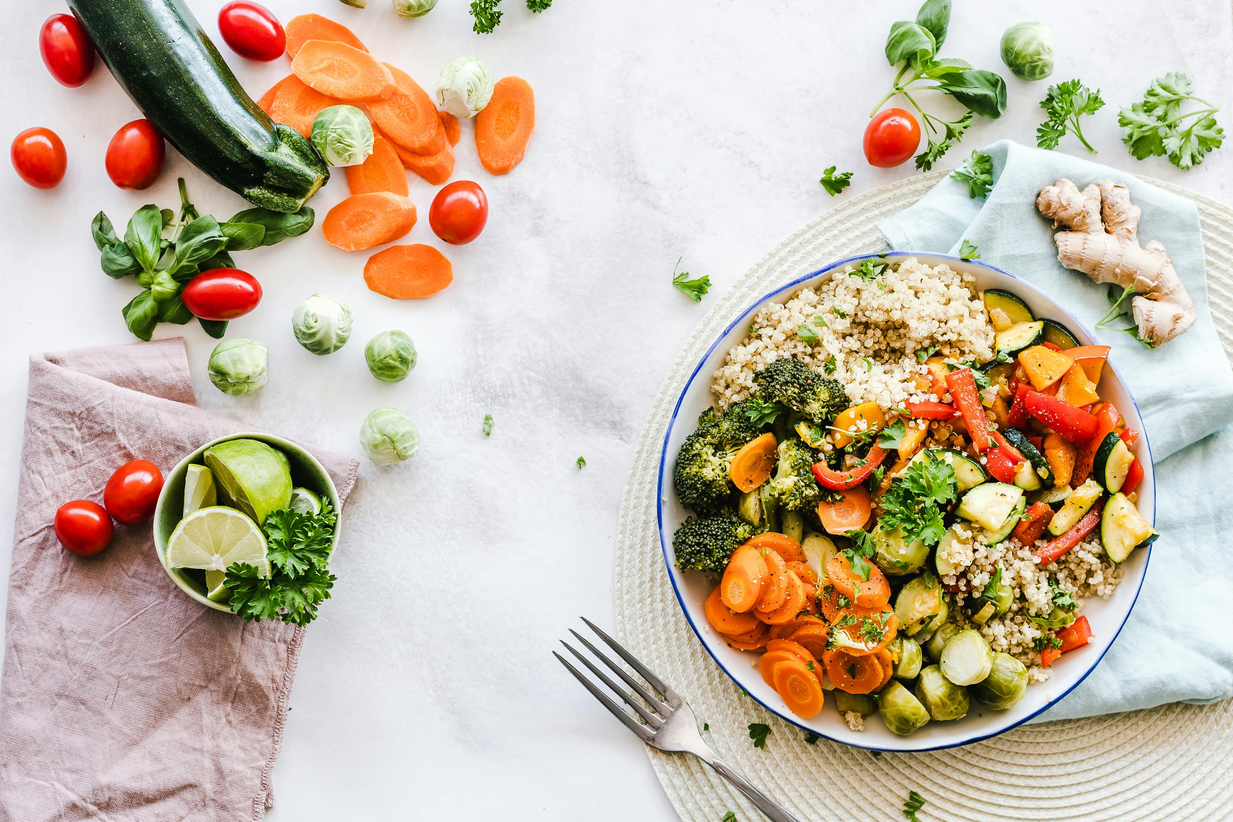 Colorful quinoa salad with fresh vegetables creates a healthy, balanced meal.